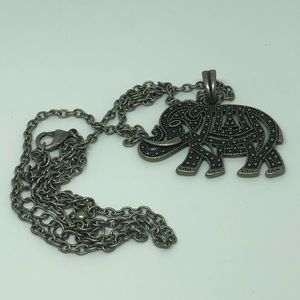 Necklace on long chain.